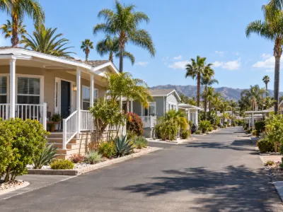 Mobile home community with single-story homes and landscaped streets